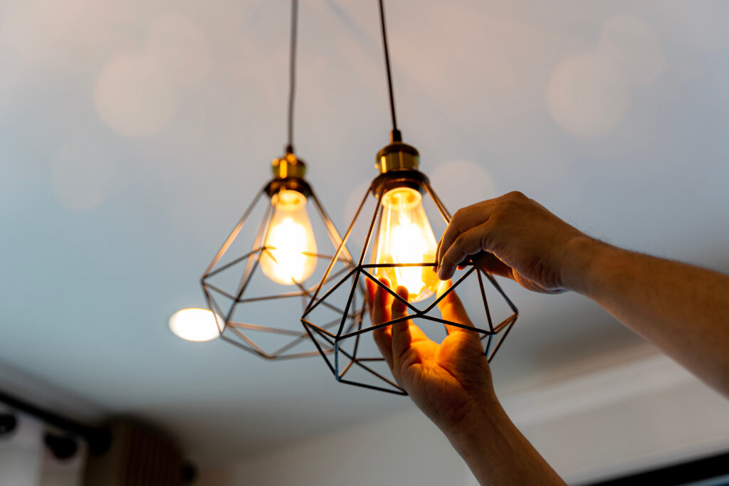 decorative antique edison style filament light bulbs hanging. an decorative antique edison style filament light bulbs hanging. an